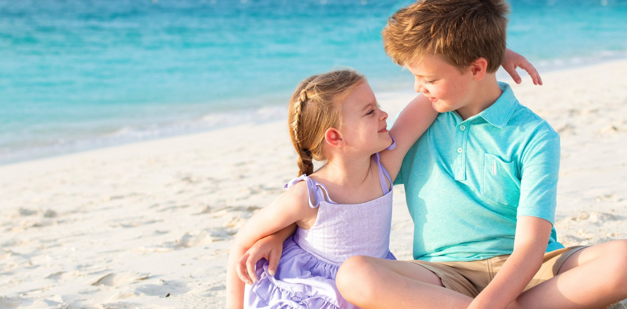Children laughing on the beach