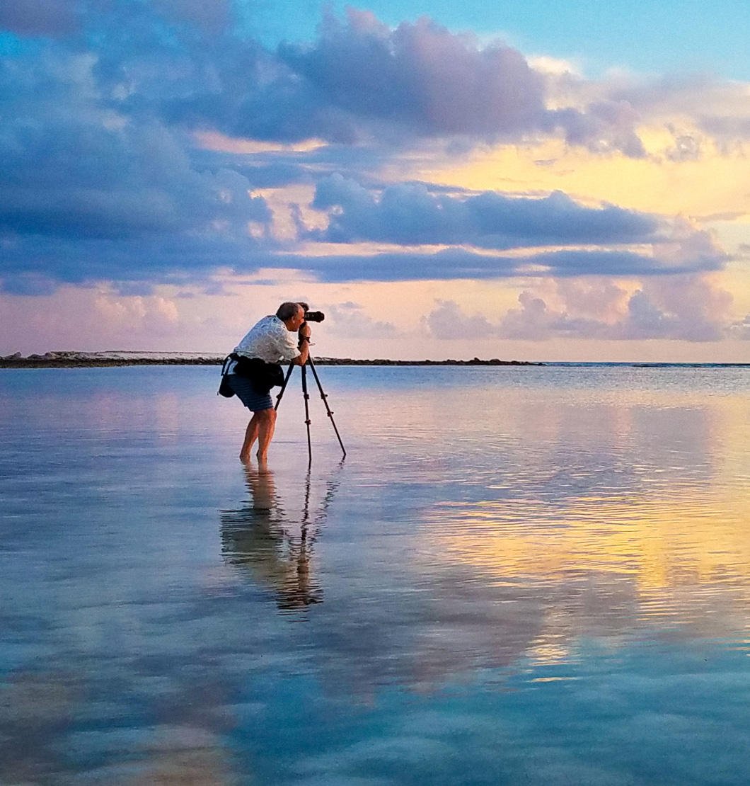 Paradise Photography photographer at golden hour on the beach