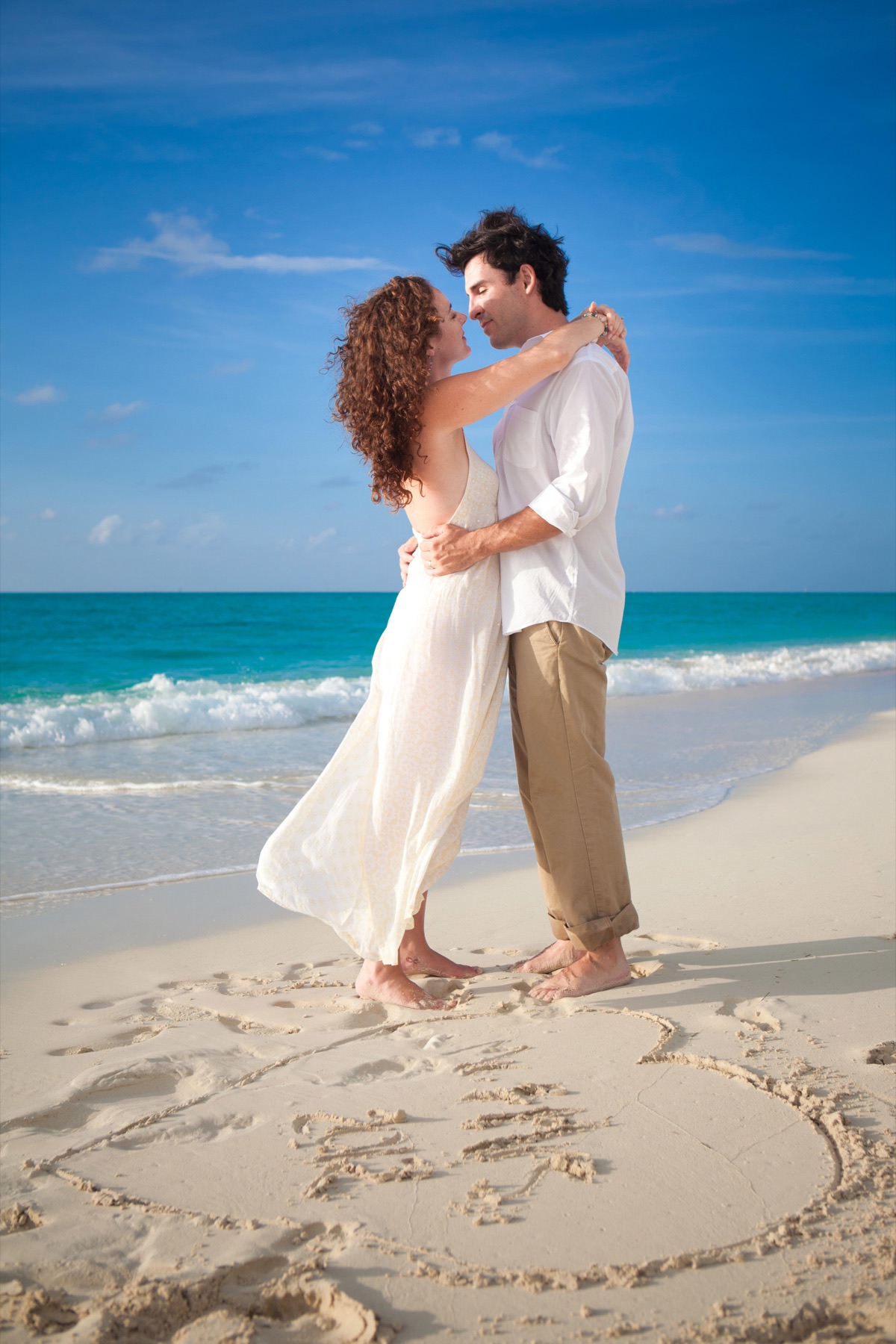 Couples beach portrait in Turks and Caicos by Paradise Photography