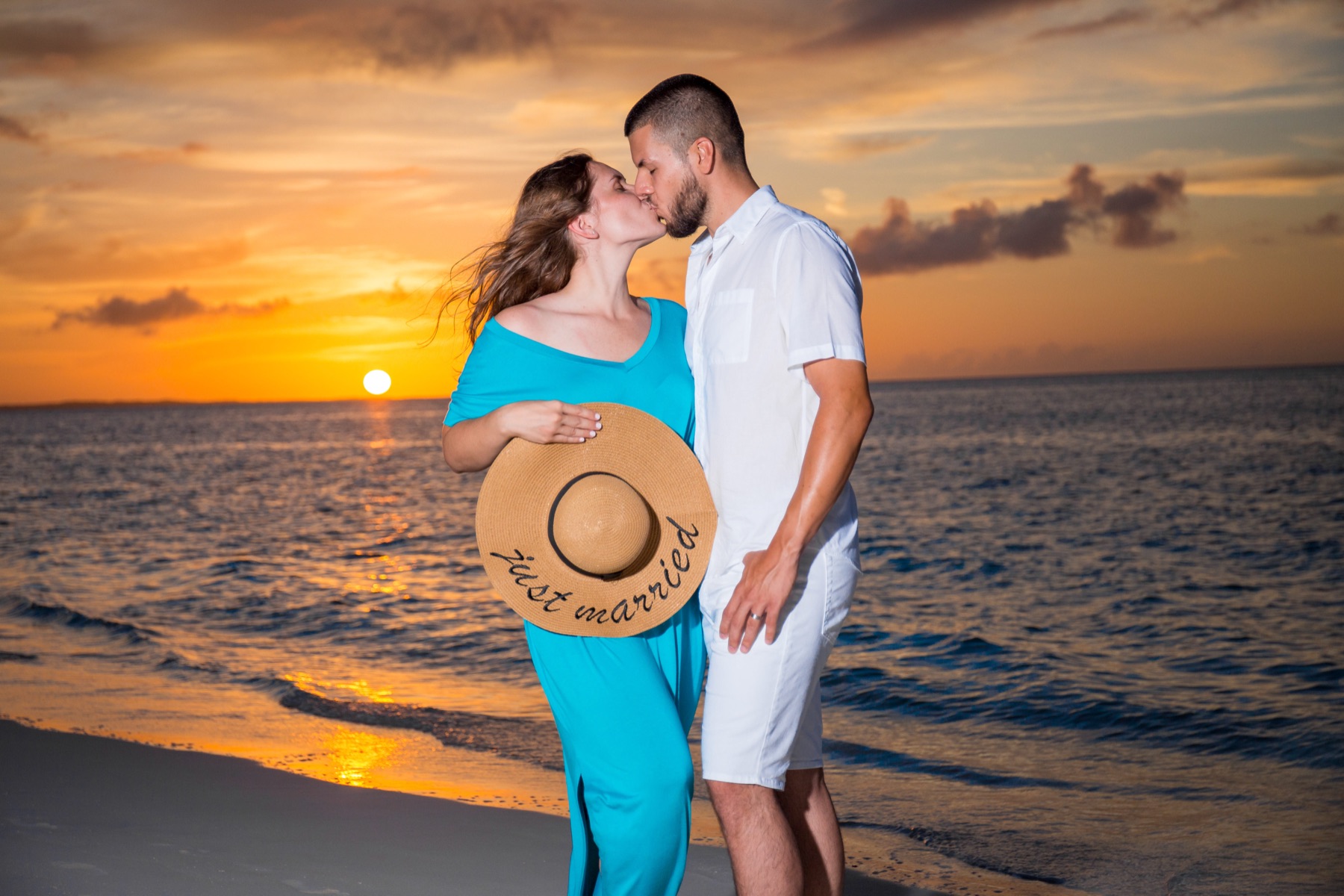 Couples beach portrait in Turks and Caicos by Paradise Photography