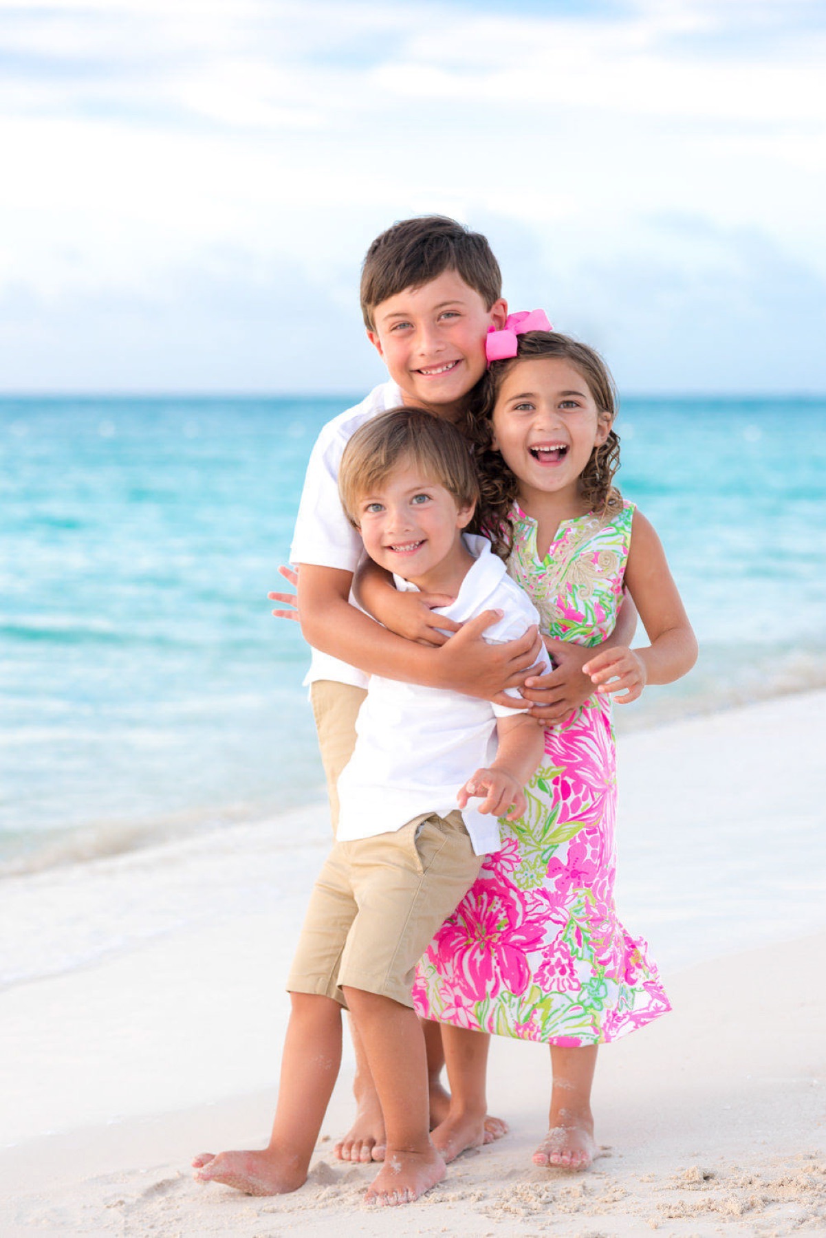 Family beach portrait in Turks and Caicos by Paradise Photography