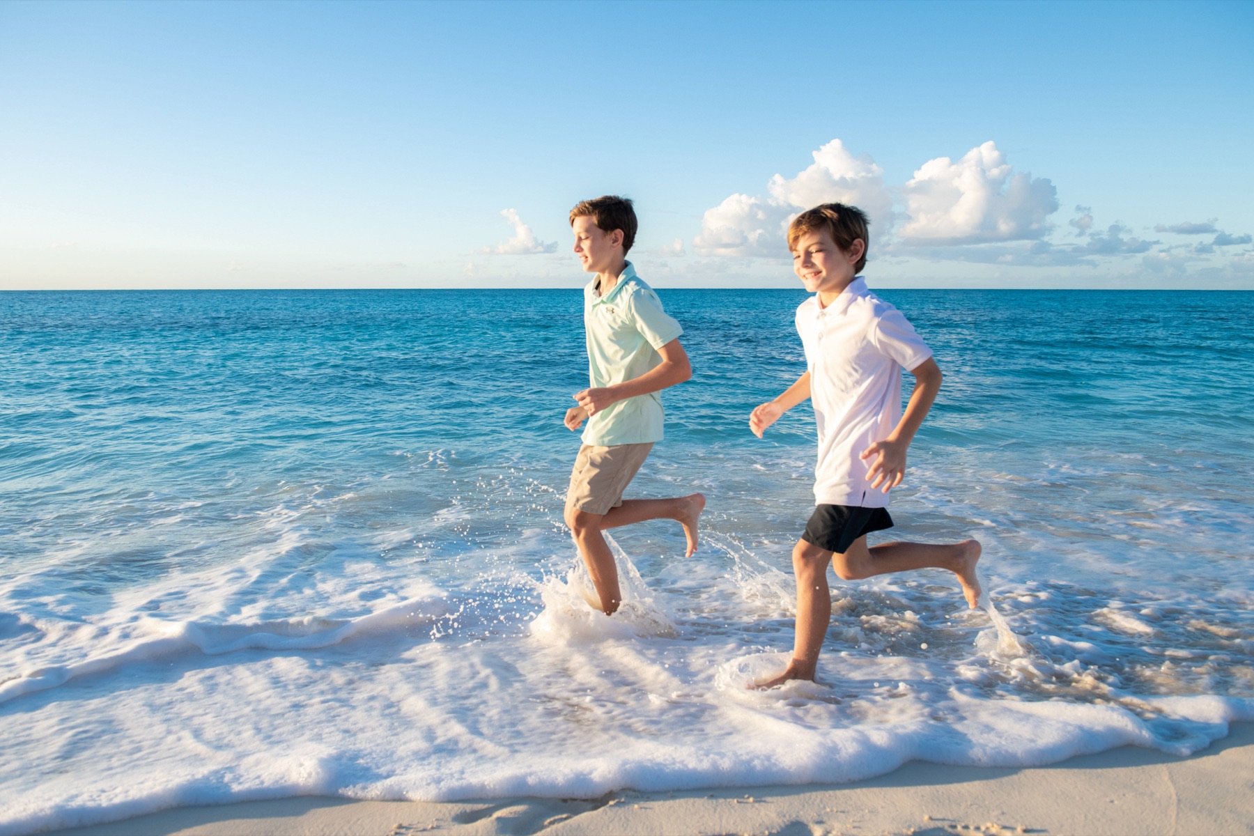 Family beach portrait in Turks and Caicos by Paradise Photography