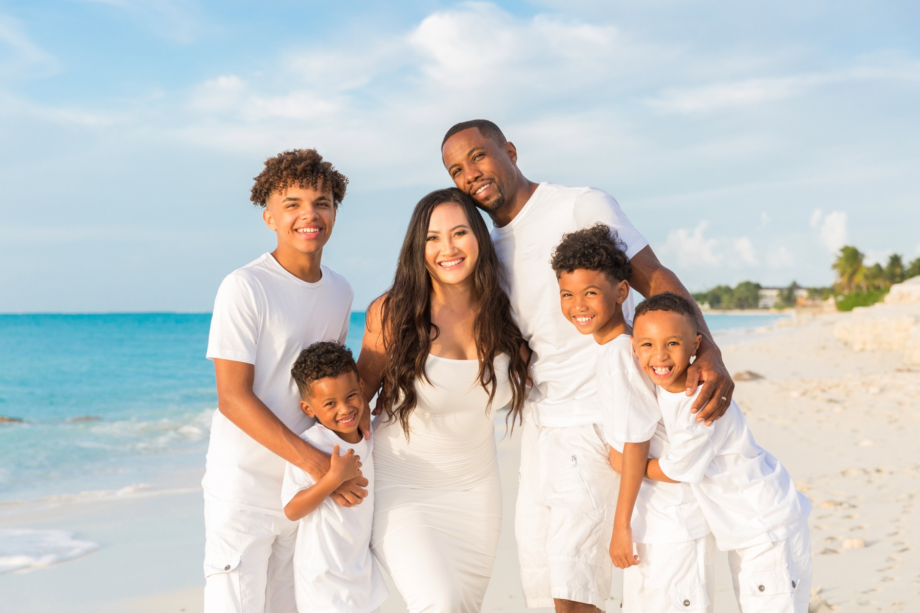 Family beach portrait in Turks and Caicos by Paradise Photography